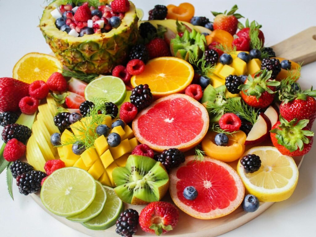 pexels photo 1132047 1132047 A vibrant assortment of fresh fruits beautifully arranged on a platter, perfect for a healthy and delicious snack.